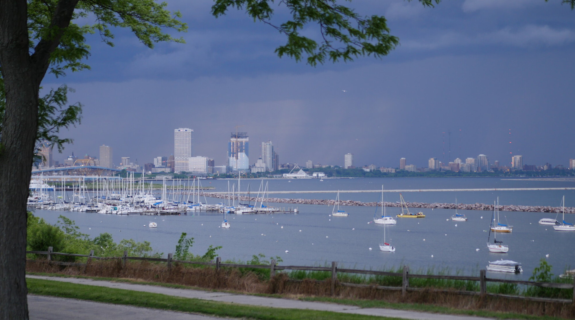 Milwaukee skyline view from Bay View bluff showing marina and downtown